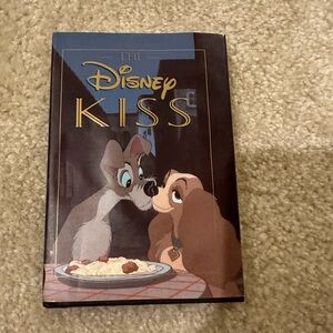 The Disney Kiss book featuring Lady and the Tramp on the cover. Bought in Disney